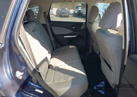 2015 Honda Cr-V Touring z USA, uszkodzony, nr VIN 5J6RM4H9XFL069253